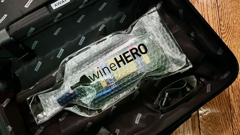 A photo of a WineHero bag in an Away Carry On suitcase