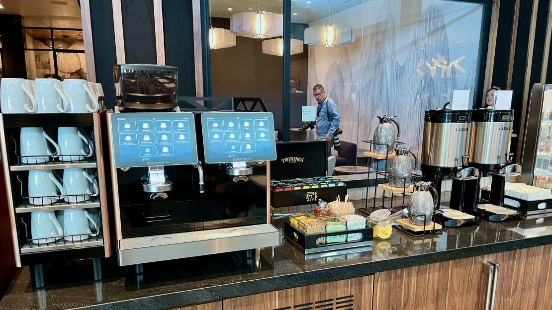 A photo of an automatic espresso machine at the Atlanta Centurion Lounge