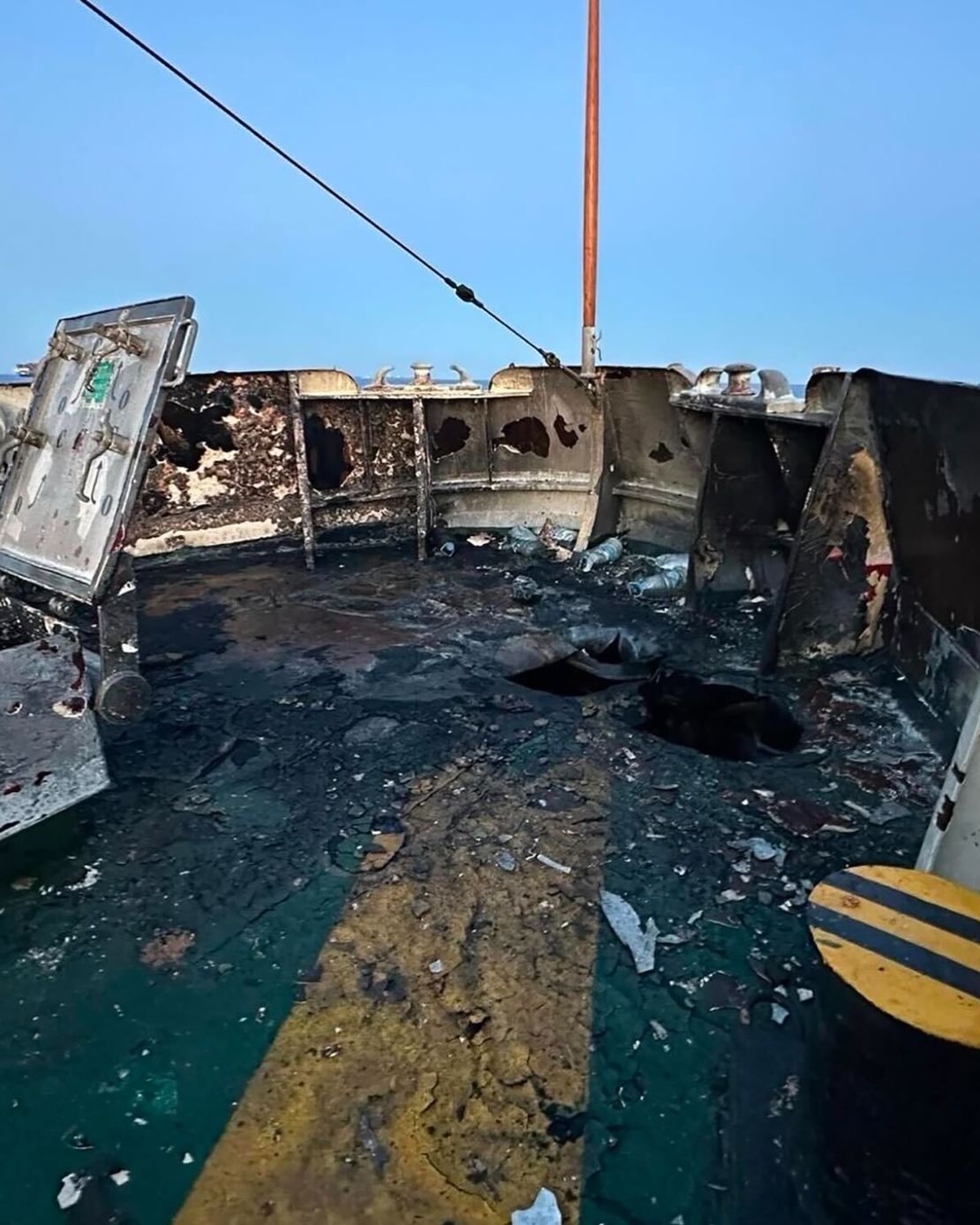 More damage is seen on the deck after the alleged drone attack.