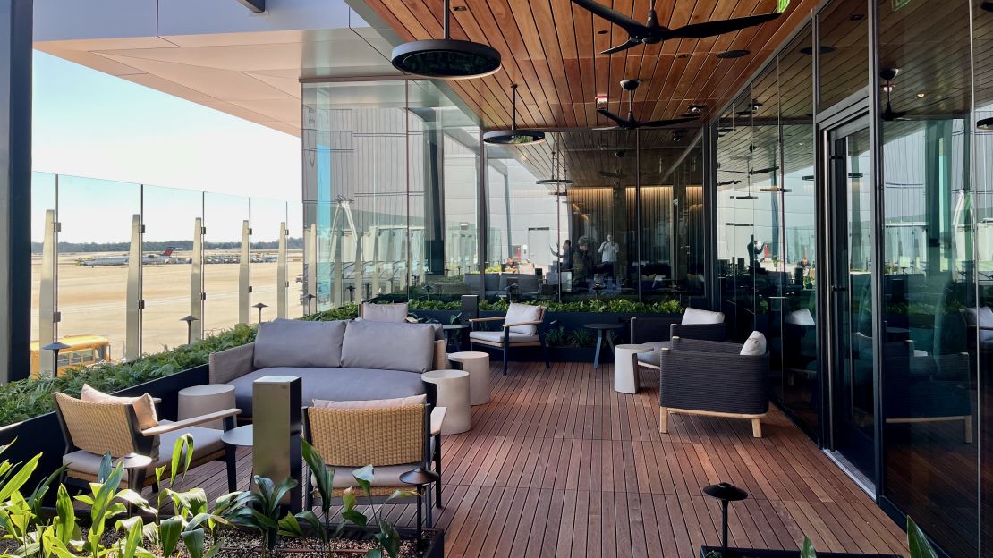 A photo of an outdoor seating area at the Atlanta Centurion Lounge