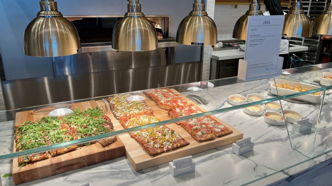 A photo of flat bread pizza at the Delta One Lounge