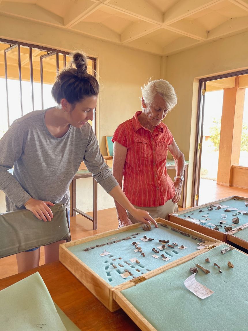 Paleoanthropologists Carrie Mongle (left) and<strong> </strong>Meave Leakey, the daughter of Louis Leakey and Mary Leakey, who found the first P. boisei fossil<strong>, </strong>discuss the new P. boisei hand fossils at the Turkana Basin Institute research station in Ileret, Kenya.