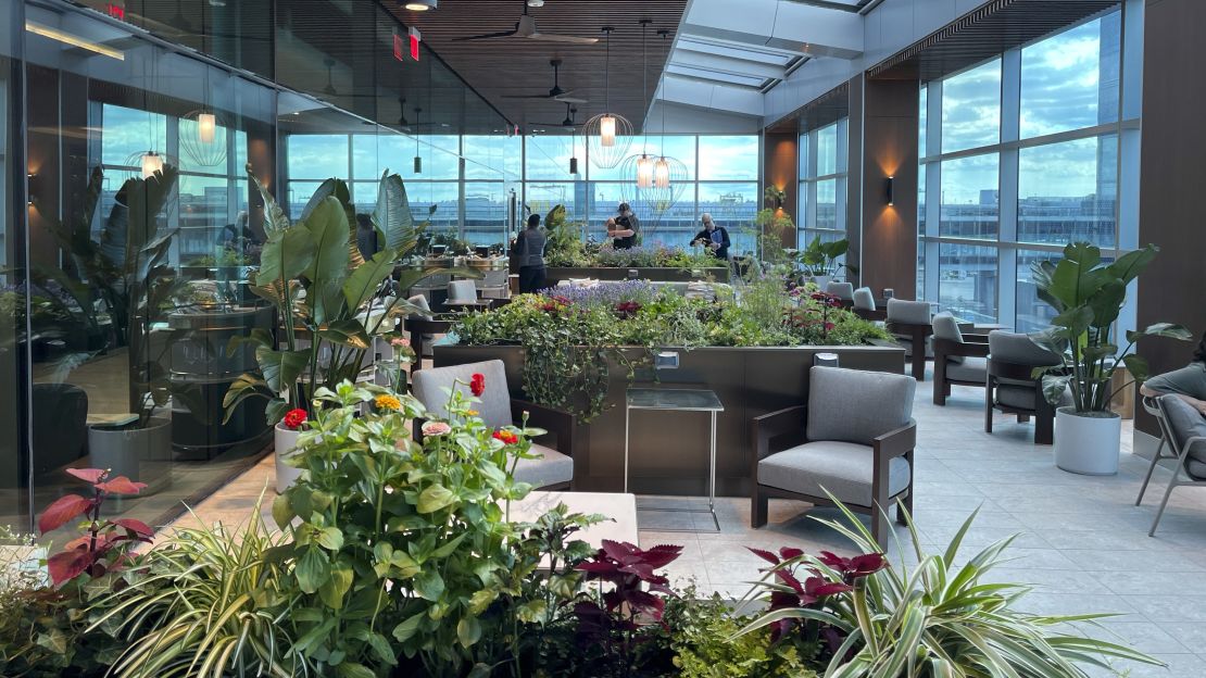 A photo of an outdoor seating area in the Delta One Lounge