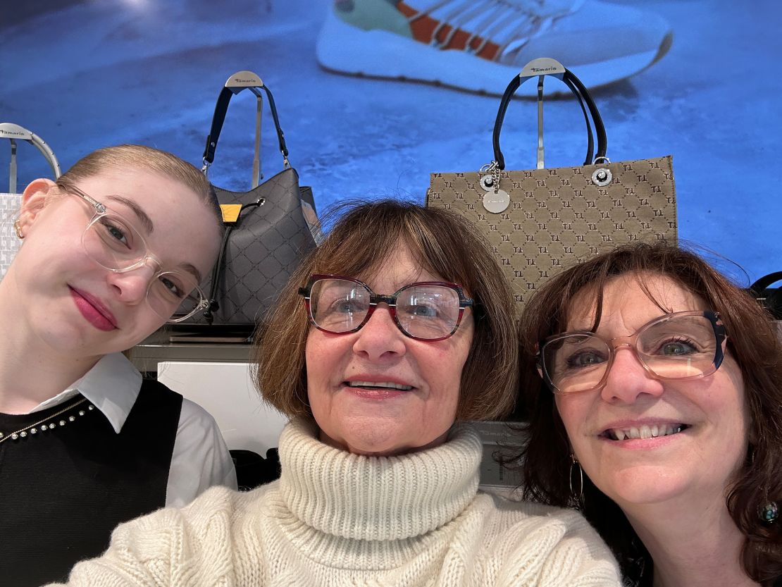 Janice, pictured with friends during a shopping trip, says a lot of her clothes “went out the door” before she arrived in France.