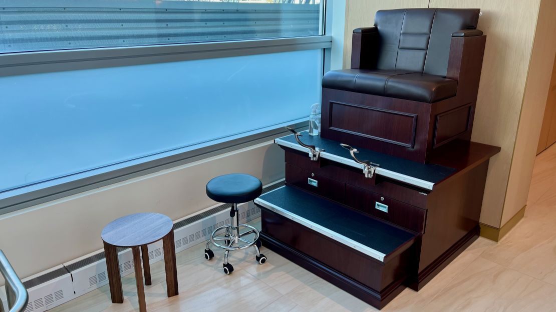 A photo of a shoe shining station at the Delta One Lounge