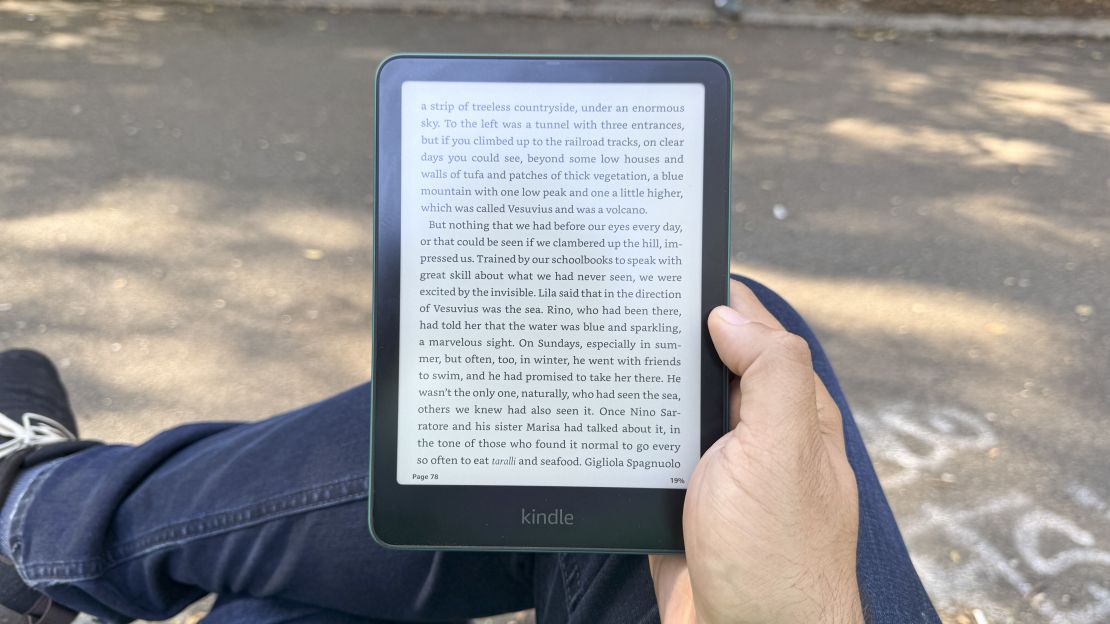 the Amazon Kindle Paperwhite 2024 held in hand on knee