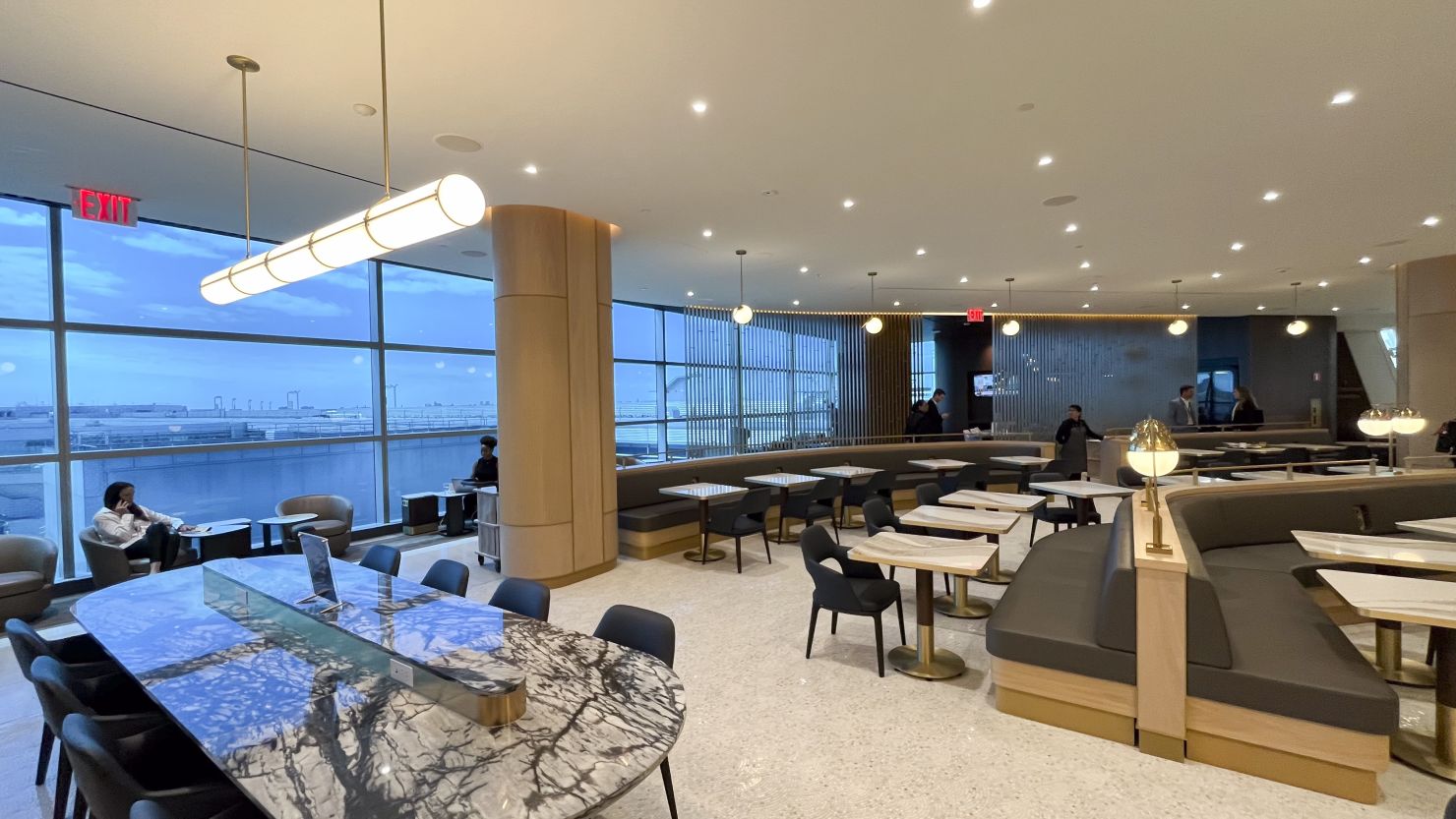 A photo of a seating area at the market dining area in the Delta One Lounge