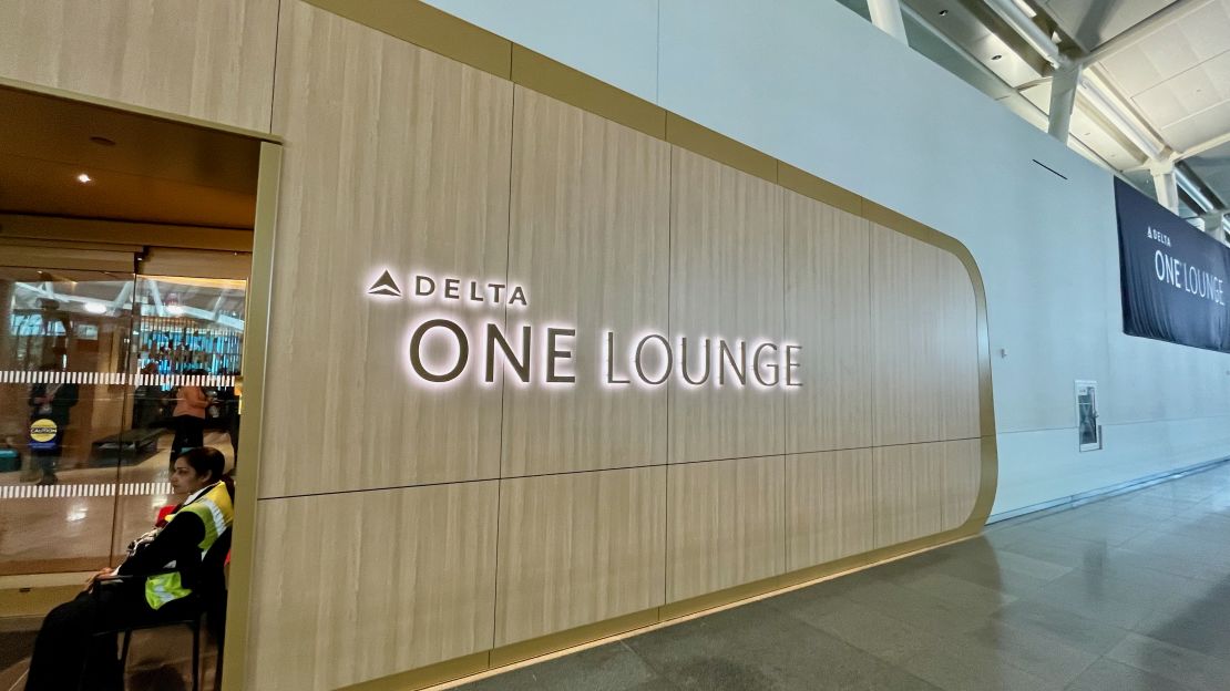 A photo of the Delta One Lounge sign at New York-JFK airport