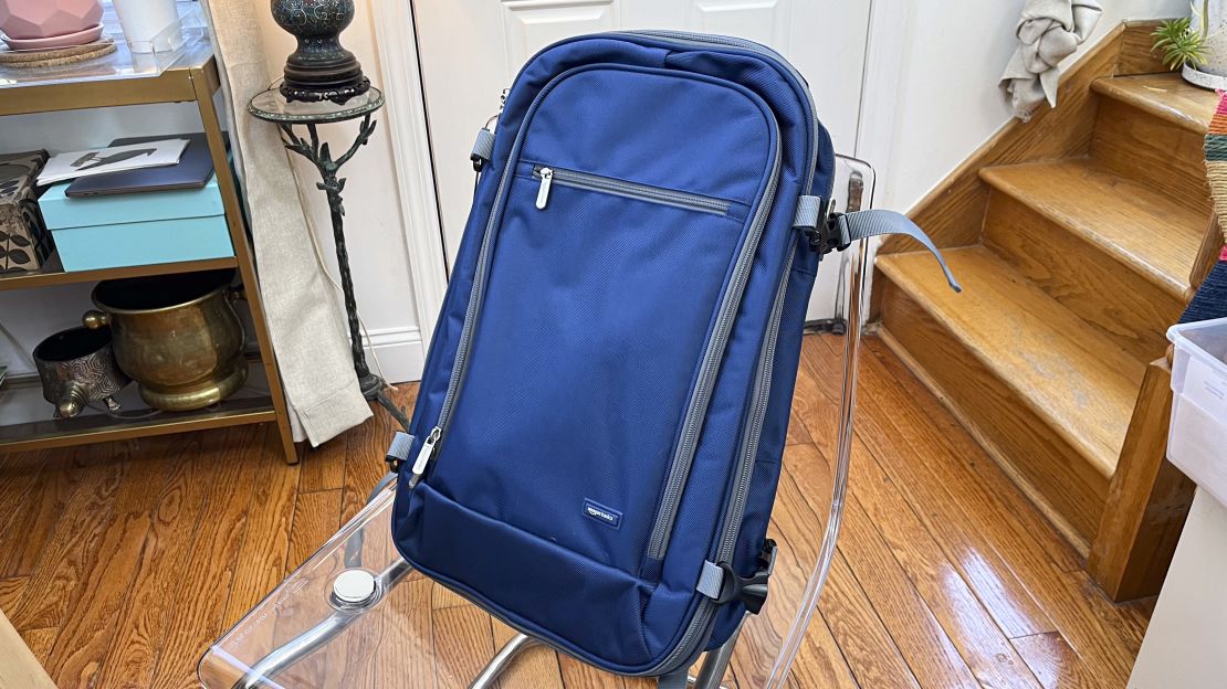 A photo of a blue Amazon travel backpack