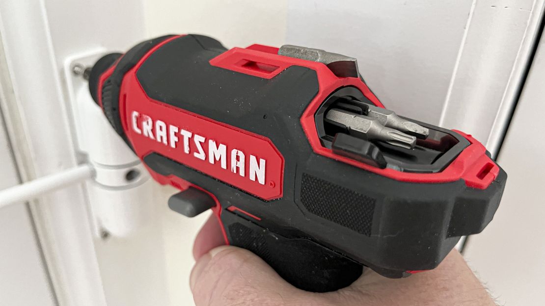 A door closer is installed on a door frame using the Craftsman Cordless Screwdriver.