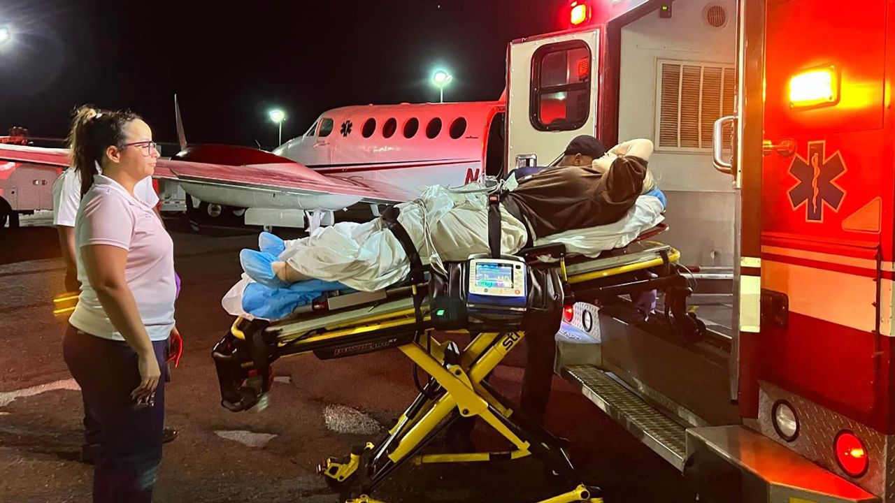 Rileigh Decker being loaded into an ambulance after the attack.
