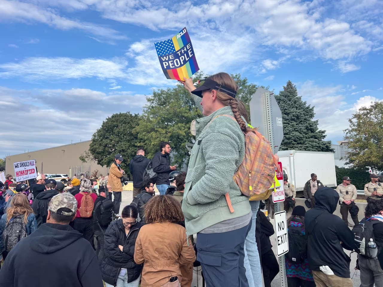 Protesters are gathered near the Immigration and Customs Enforcement facility in Broadview, Illinois, on Friday.