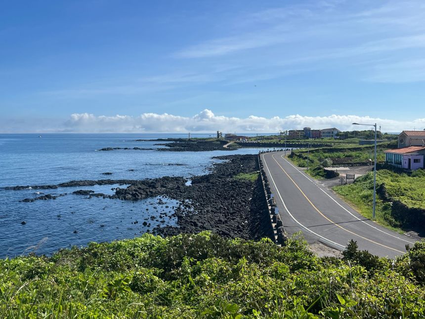 Sparkling blue waters and basalt by the coastline in Jocheon-eup, Jeju Island.