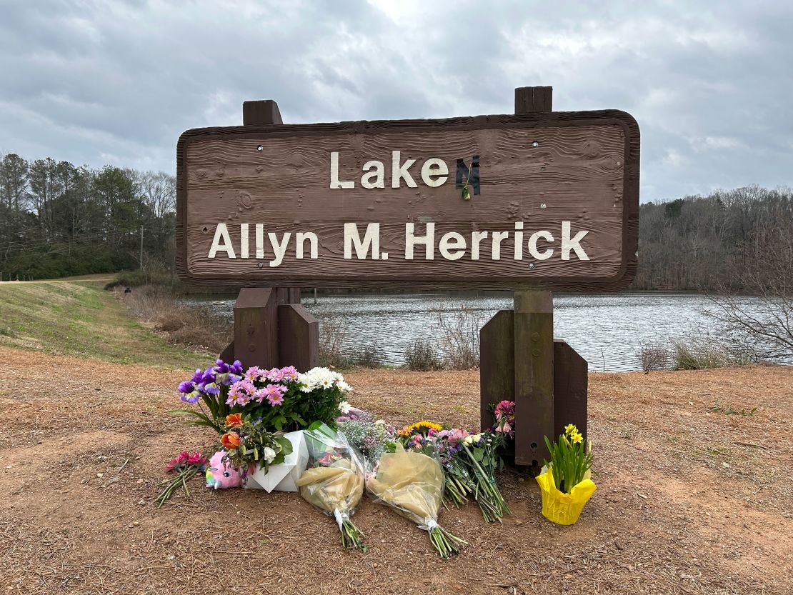 A makeshift memorial for Laken Riley is seen at Lake Herrick in Athens, Georgia, where she often went jogging.