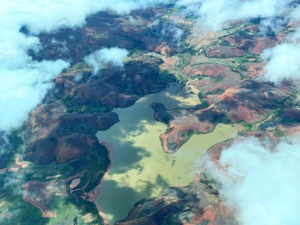 While Makira Natural Park is relatively intact, the rest of Madagascar has suffered from severe deforestation, with <a  target="_blank">one 2023 study</a> estimating that it has lost 80% of its natural areas. In this aerial photo, the areas that appear brown and red have been deforested.