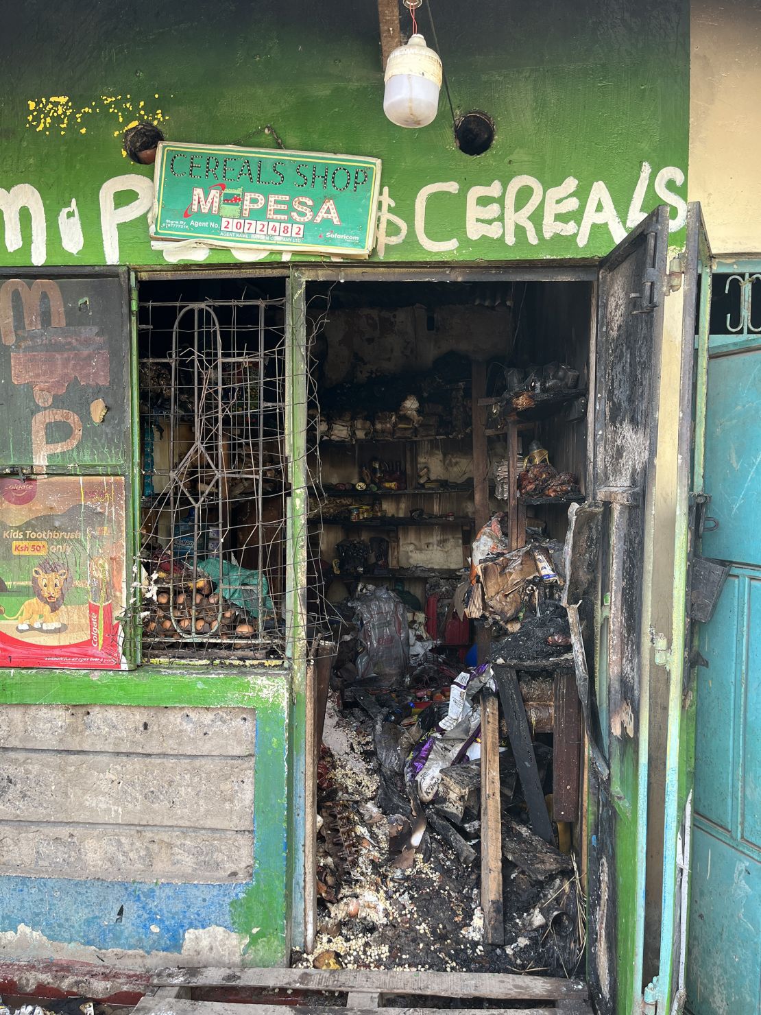 The charred remains of Phylic Kerubo’s convenience store.