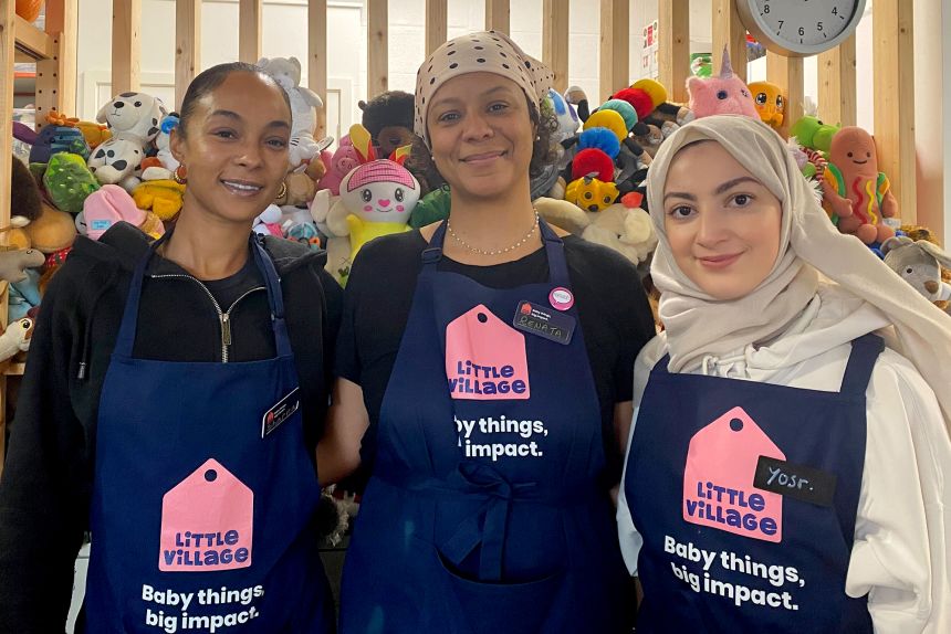 Renata Acioli (center), who manages Little Village's baby bank in Wembley, is pictured with fellow staff members Sharna Singh (left) and Yosr Bahr (right).
