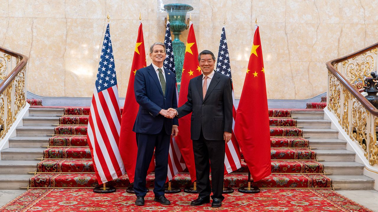 He Lifeng, China's vice premier, shakes hands with US Treasury Secretary Scott Bessent in London on Monday.
