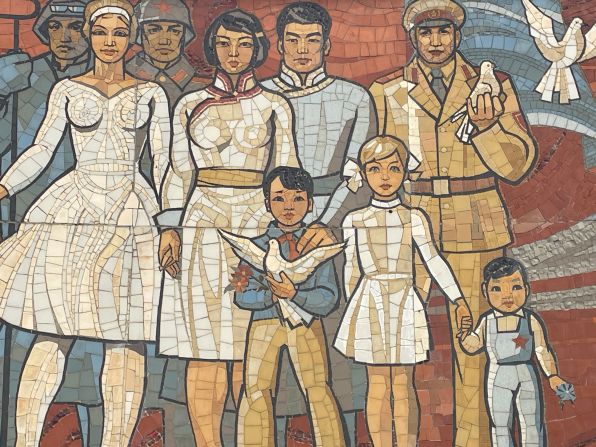 <strong>Signs of the times:</strong> Inside the memorial, tile mosaics depict Mongolians and Soviets living together in harmony.