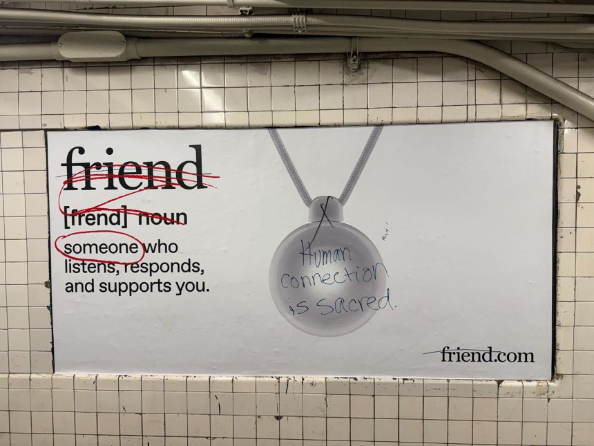 A defaced ad for the Friend device in New York City's subway system.