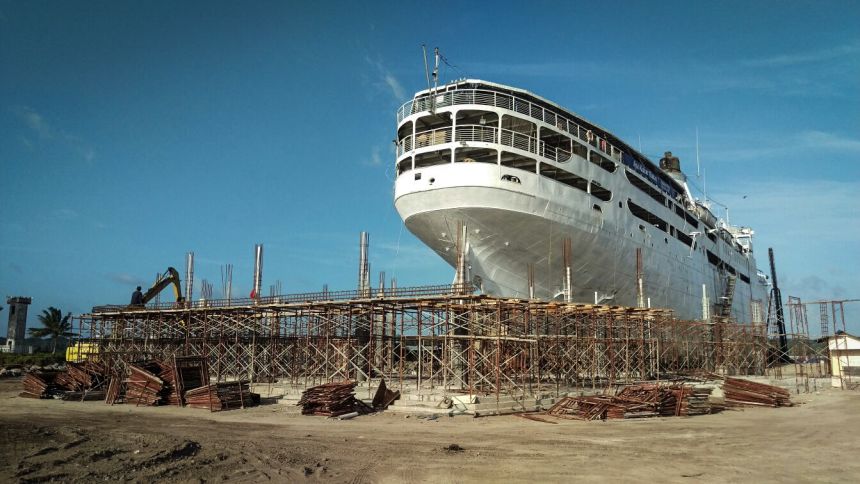 The ship rests on a 427-by-52-foot concrete platform supported by piles driven deep into the sea bed.