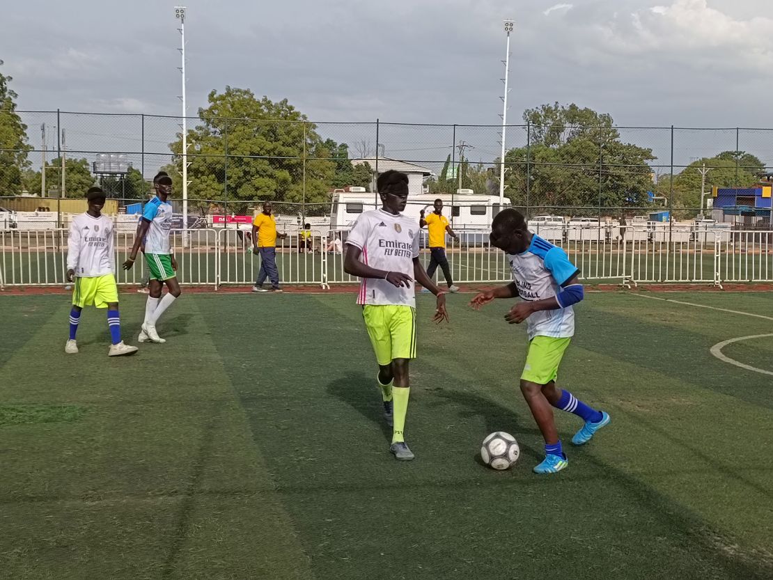 A player attempts a dribble during a Blind Premier League game.