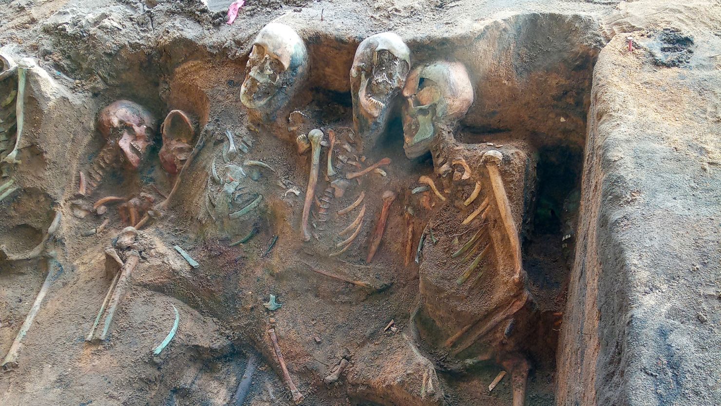 Tightly packed remains in the mass grave