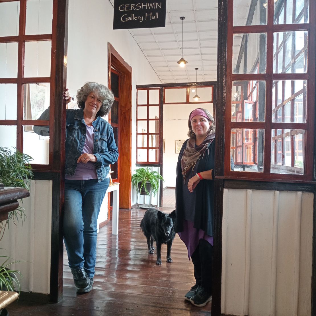 Ruth, pictured with a friend, says that their social life is far more active in Ecuador.