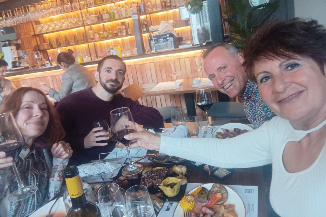 Gail and Greg having dinner with their friend Sergio, who plays padel with Greg, and his mother.