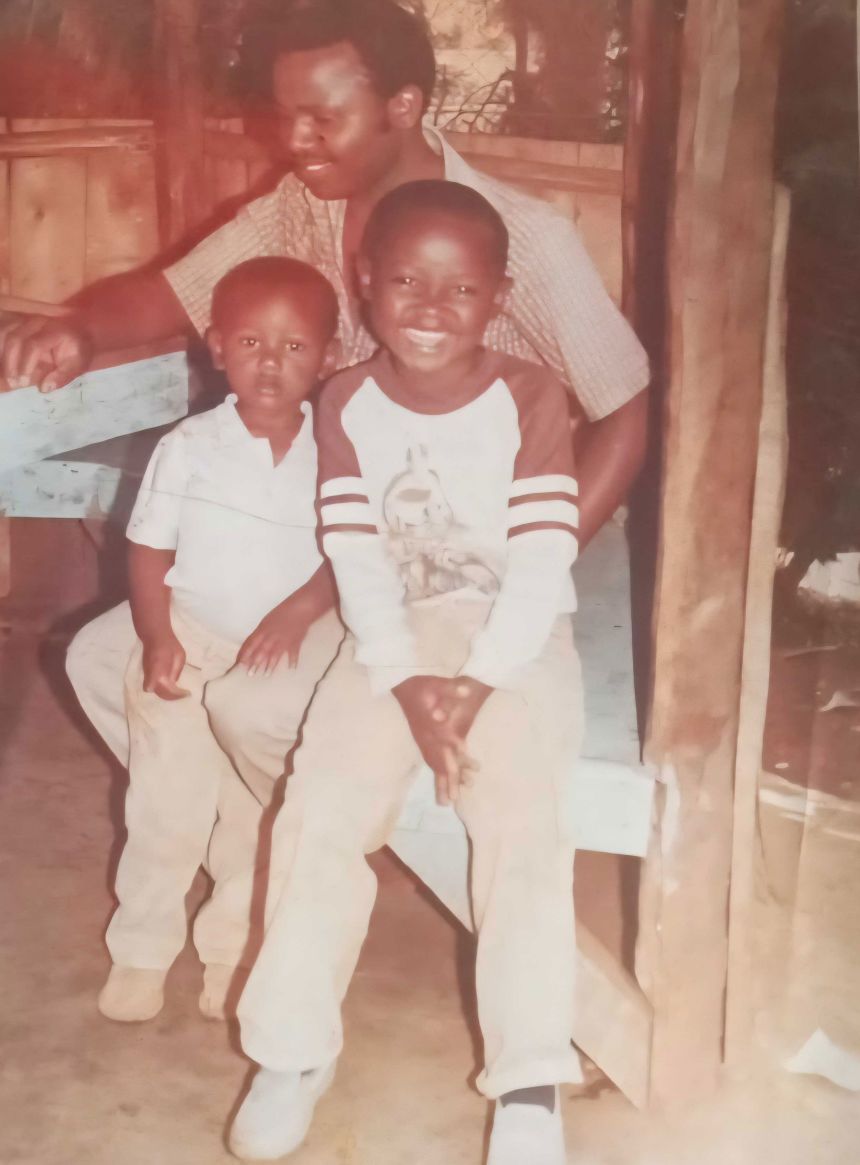 Reuben Waithaka had brought this old photo of him and his sons, including Willington Barua, right, to share with his grandson.