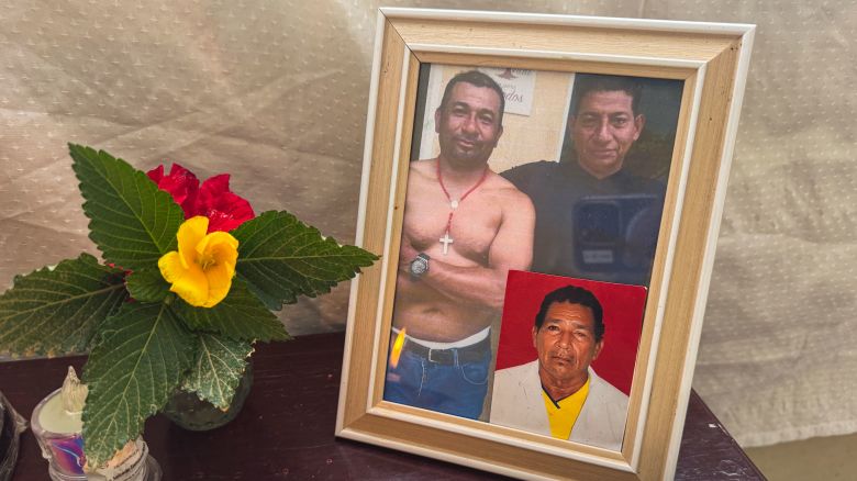 Andrés Fernando Tufiño Chila, pictured on the left side of the framed photo, survived a US strike in the Caribbean.