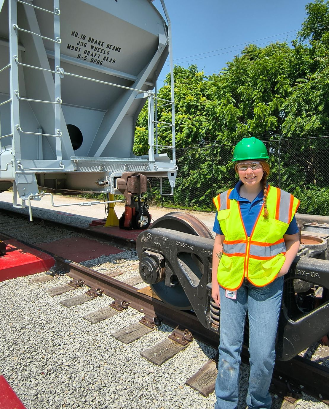 Chloe Lawson stands in front of a railcar on June 9 in Excelsior Springs, Missouri.