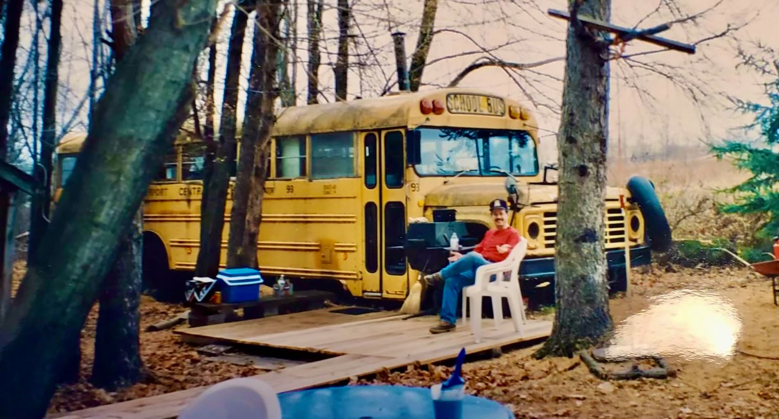 Hill's grandpa and stepdad (pictured) converted an old school bus into a skoolie that she used to play and sleep in as a kid.