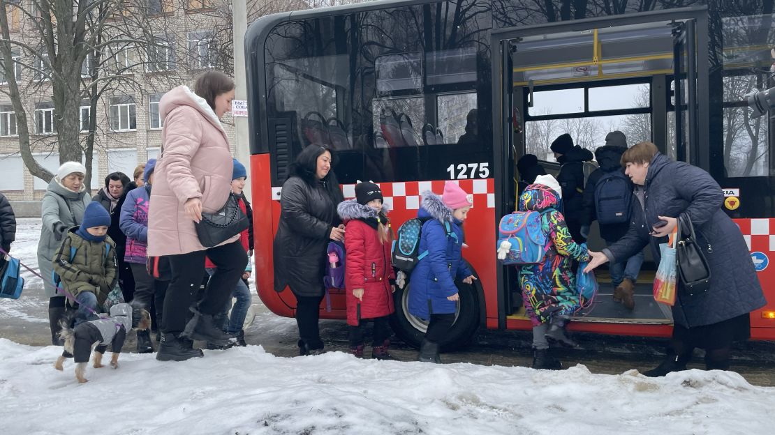 Children at the metro school take a bus from their old school to the subway station where they have in-person classes every other day.