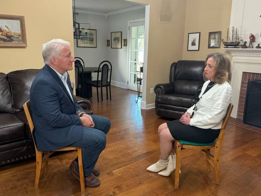 Pennsylvania voter Joan London talks with John King in Wyomissing, Pennsylvania.