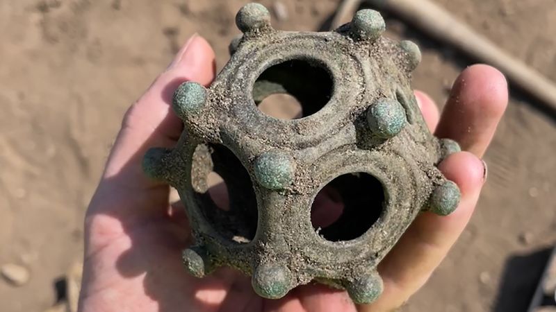              Amateur archaeologists in England have unearthed one of the largest Roman dodecahedrons ever found, but mystery surrounds what it was act