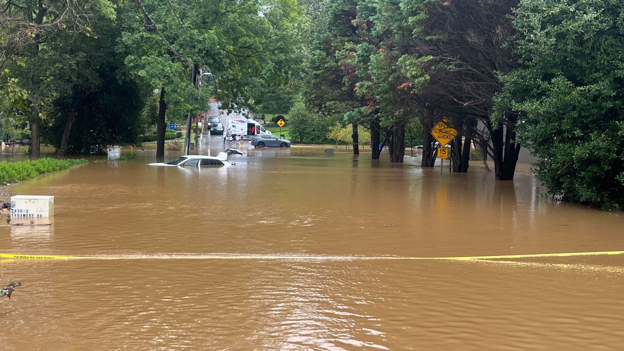 Angelina Madut's car sits Friday morning in the flood in Atlanta's Buckhead neighborhood.