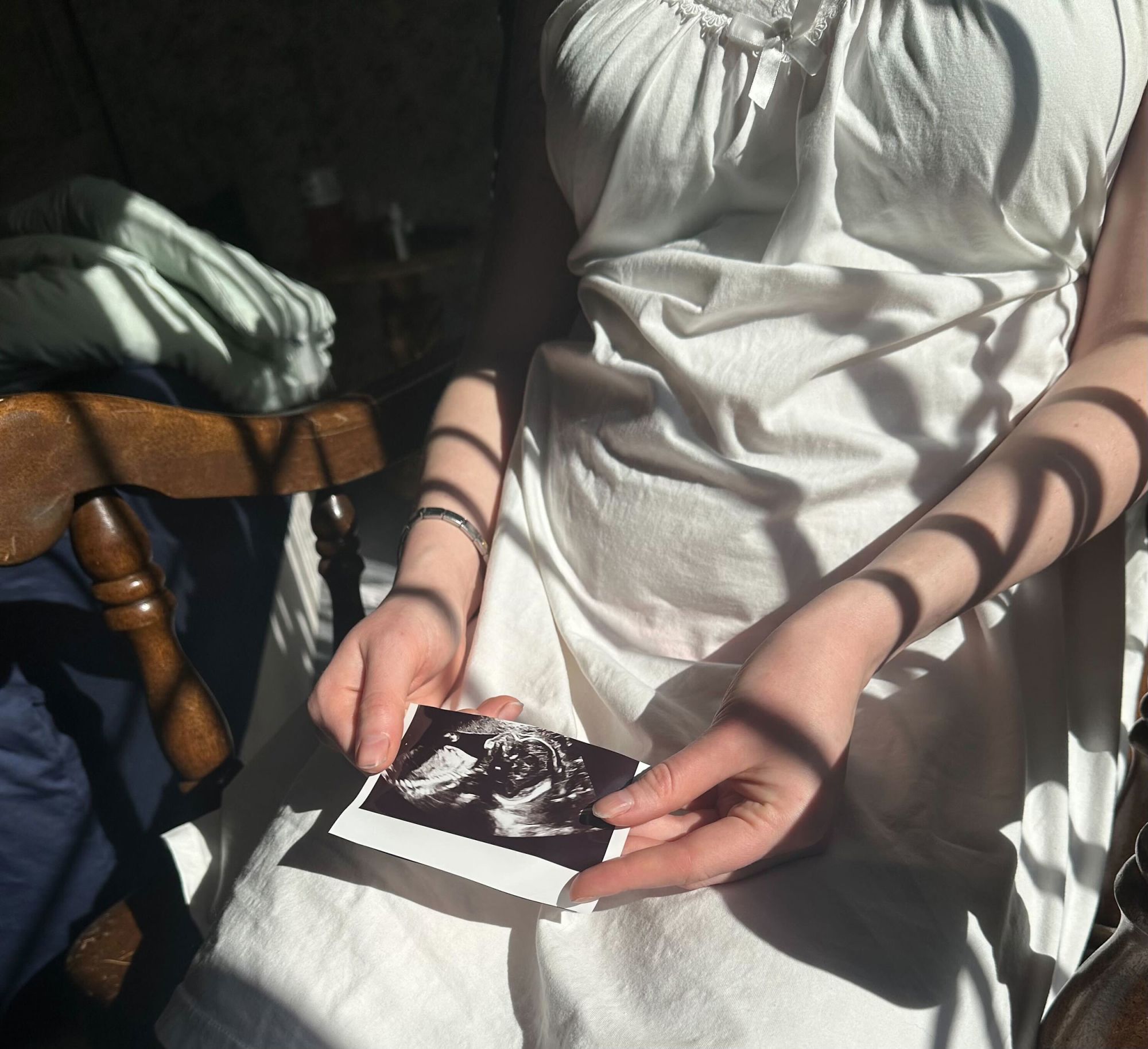 Liza, a grad student in Texas, is 24 weeks pregnant and suing the Trump administration over its birthright citizenship ban. She worries her baby, due in May, could be denied health care or education.