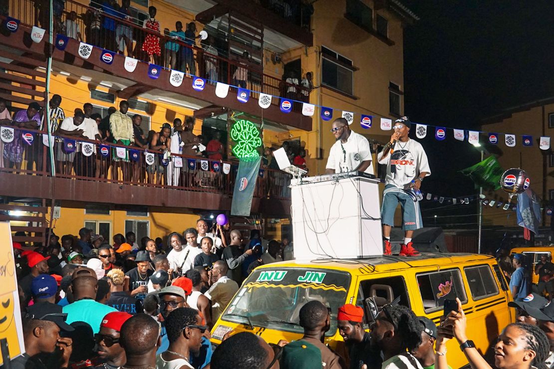 DJ K.A.S. and Toby Shang entertain the crowds in Surulere in December 2024.