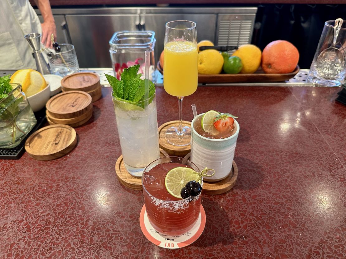 A photo of four cocktails at the Capital One Lounge at Washington Dulles International Airport (IAD)