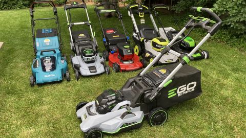 The six mowers we tested. In rear: Makita Self Propelled, Ego Power Plus LM2101, Toro Recycler Smart Stow, Ryobi Smart Trek, Greenworks Pro Cordless. In front: Ego Power Plus Select Cut.