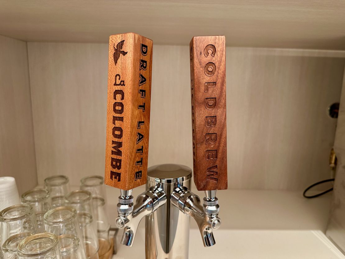 A photo of self-serve cold brew coffee taps at the Capital One Lounge at Washington Dulles International Airport (IAD)