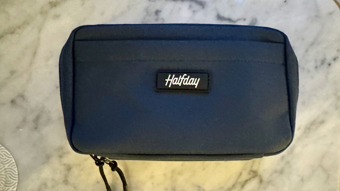 A photo of a blue Halfday tech organizer