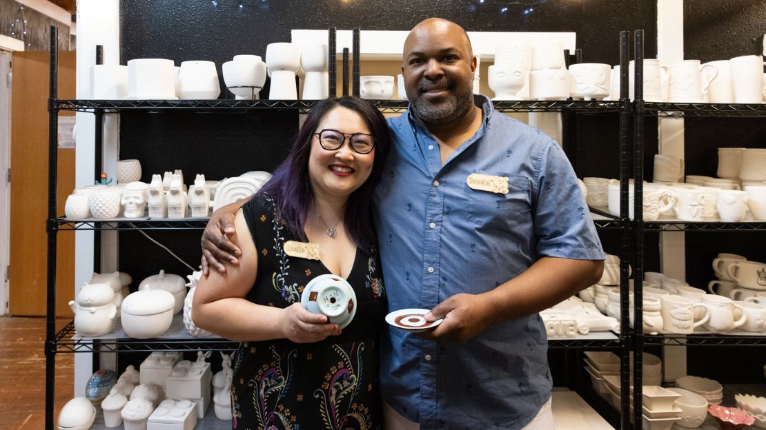 Herschel Wilson owns a pottery painting studio with his wife, Noelle, pictured. The pieces they buy are mainly imported from countries like China, making their business sensitive to the effects of potentially higher tariffs.