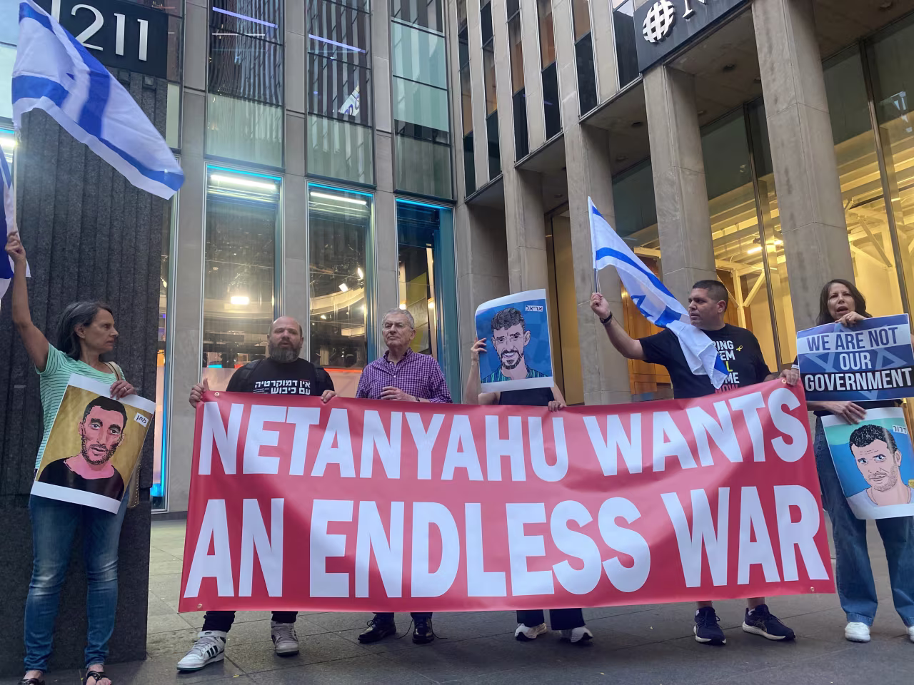 UnXeptable members protest outside the News Corp. Building in New York on Friday.