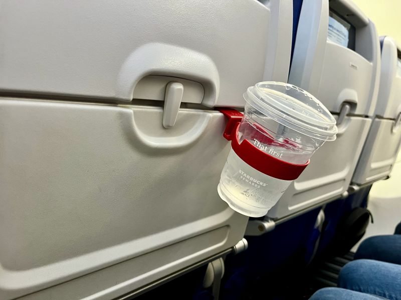 This $15 airplane cup holder is a must-have for frequent travelers