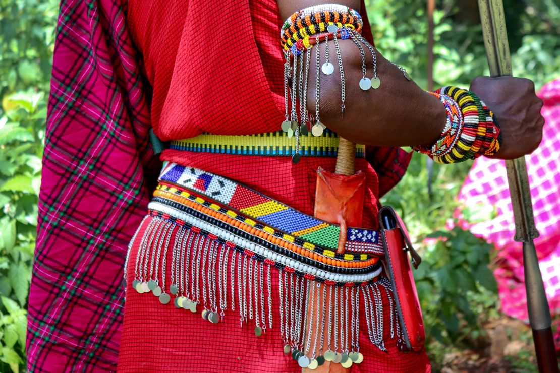 Traditionally, the Maasai wear red cloth robes, called shukas, and colorful beads.