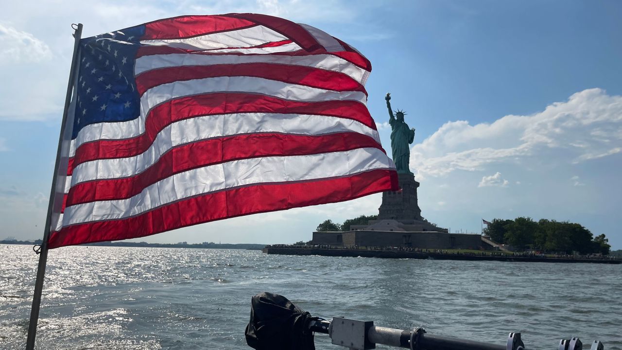 An American flag flys from the back of a NYPD boat on July 3, 2025.