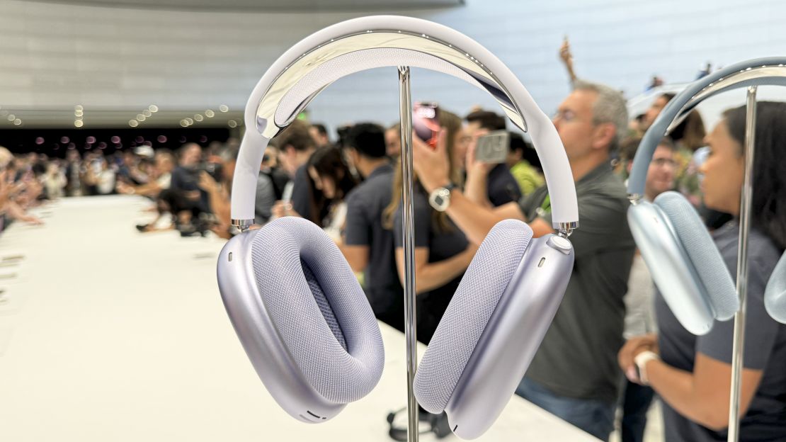 The purple Apple AirPods Max USB-C in a crowded room