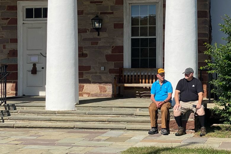 Steve Hildreth, 84, and his son sitting outside the visitors’ center at Manassas National Battlefield Park after not being able to enter the visitors’ center today on Friday.
